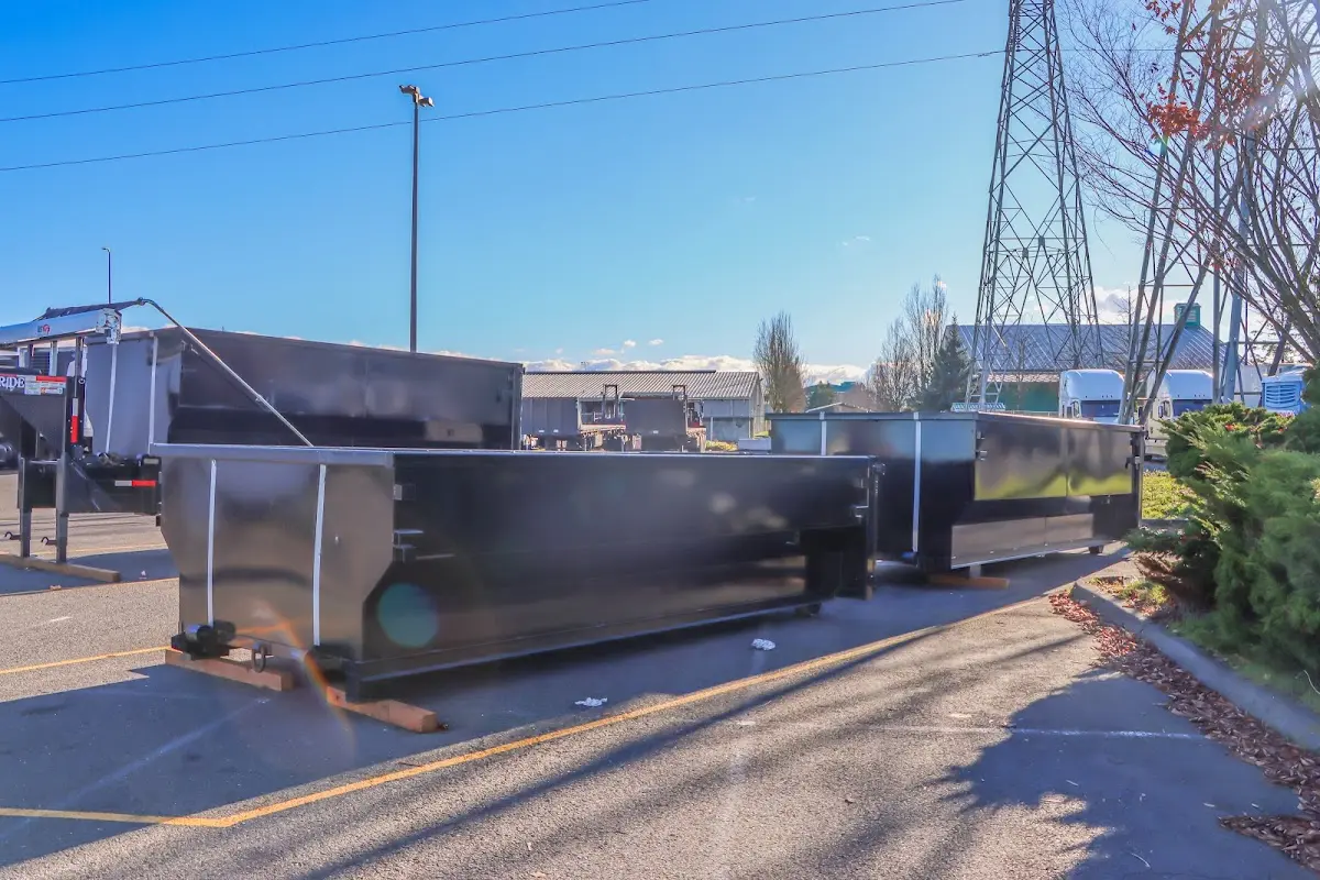 Roll-off dumpster ready for waste disposal at job site for Roofing Dumpster Rental in Jonesboro